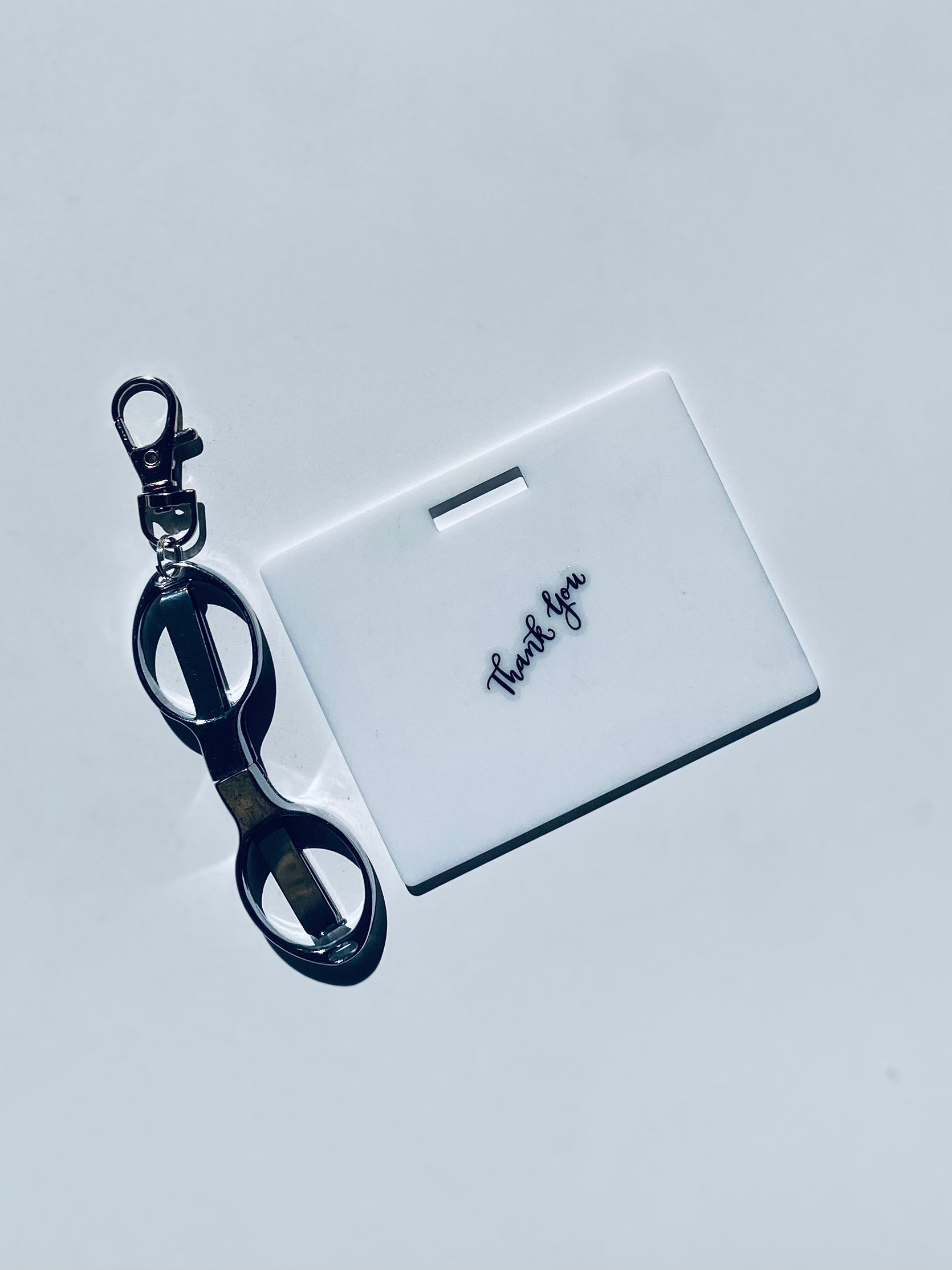 Horizontal erasable badge with mini Scissors is the perfect pocket-sized accessory for healthcare professionals. Easily write on it with ballpoint pen, wipe it clean with alcohol pad, and reuse. Made of lightweight soft silicone, it's a nurse's essential for taking notes on the go. Attach it to your ID badge for convenience. ATTENTION: Gel &amp; super smooth/colored ink will smudge and may leave faint stains. www.badgenote.com