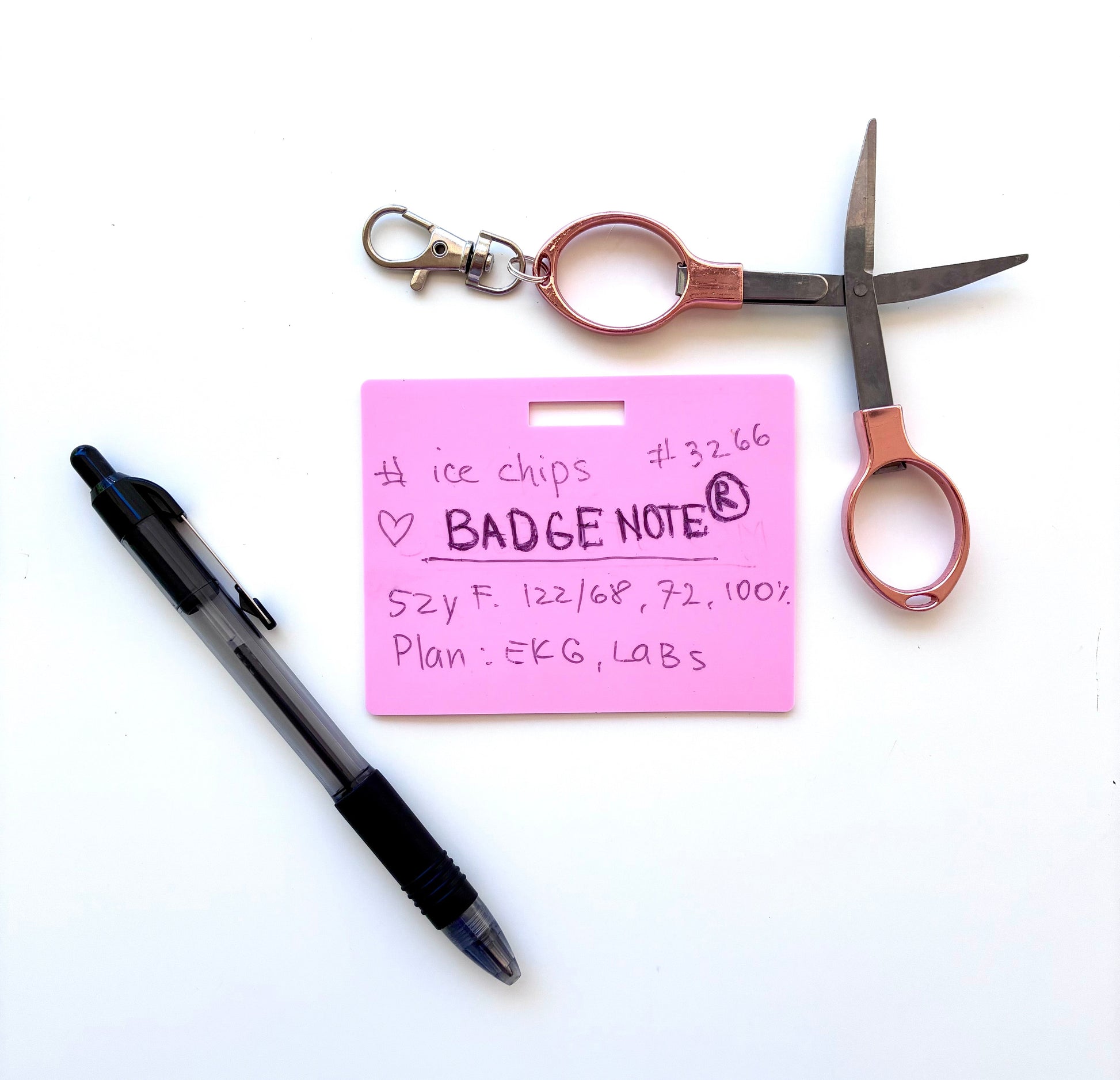 This practical badge note bundle pairs a horizontal design with a ballpoint pen (black ink) and compact folded scissors—ideal for healthcare professionals, educators, and office environments. The reusable surface accepts standard ballpoint ink and wipes clean with an alcohol pad for repeated use. Note that gel and certain smooth ballpoint formulations may leave residual marks; we recommend testing your preferred pen before regular use to ensure optimal performance and appearance. BADGENOTE.COM