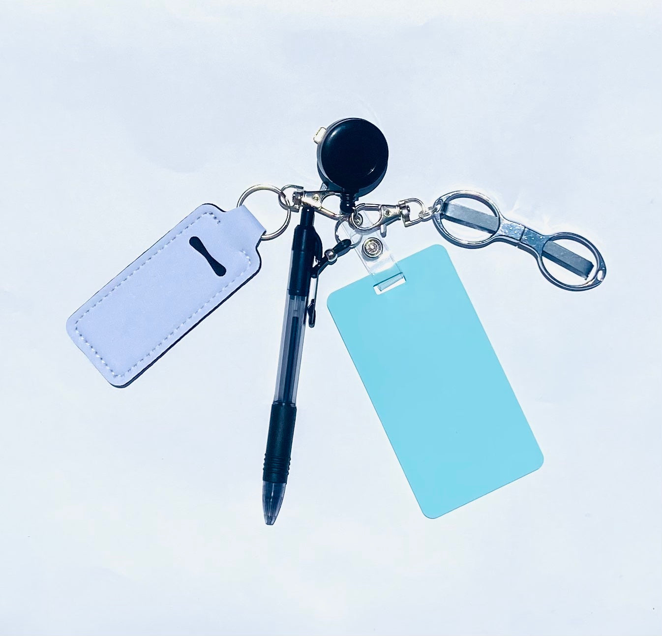 Erasable, reusable badge note with mini scissors, ballpoint pen, chapstick holder and badge reel. Complete gift idea set for healthcare professional,&nbsp; educators, office staff and more. BADGENOTE.COM