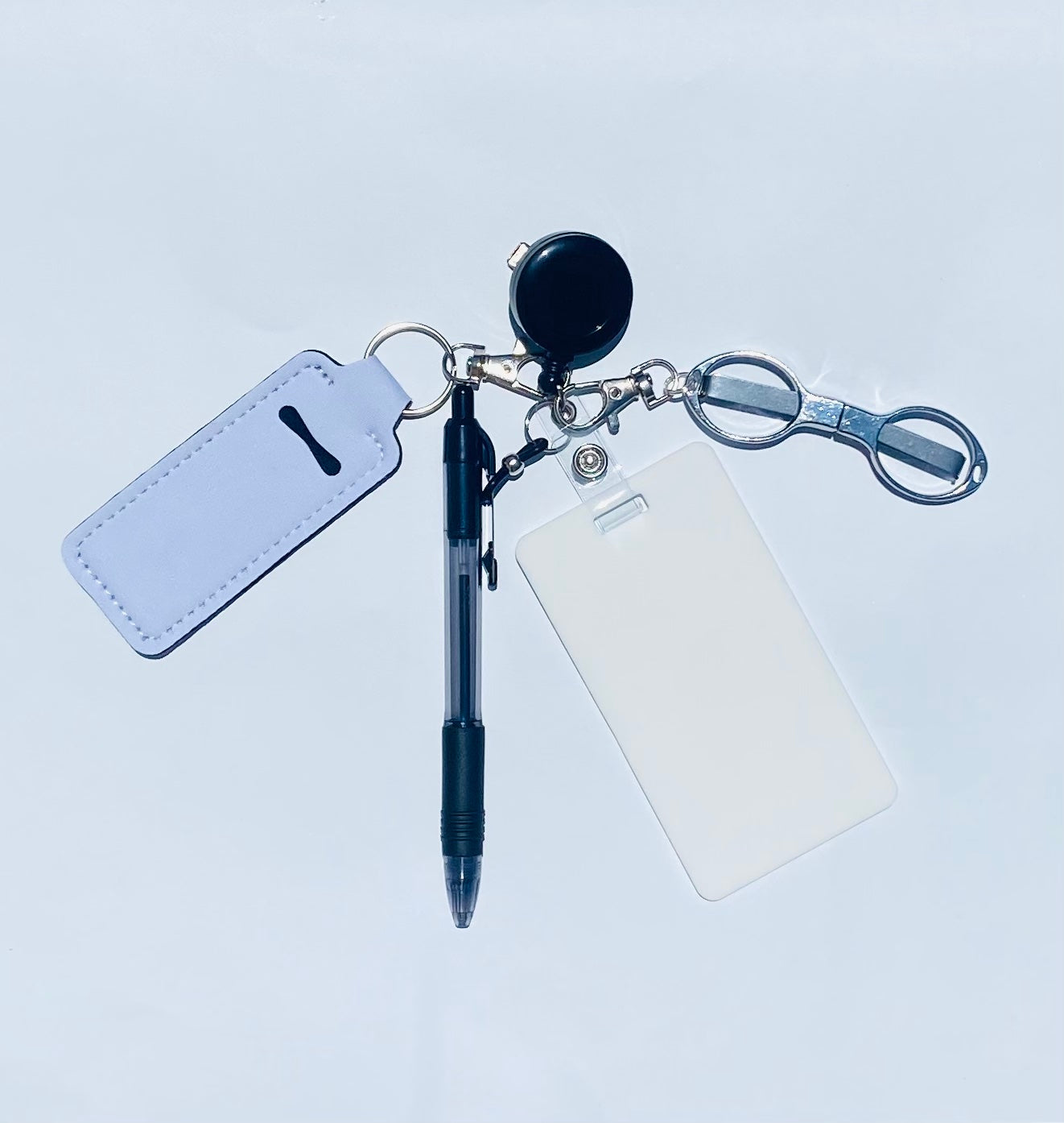 Erasable, reusable badge note with mini scissors, ballpoint pen, chapstick holder and badge reel. Complete gift idea set for healthcare professional,&nbsp; educators, office staff and more. BADGENOTE.COM