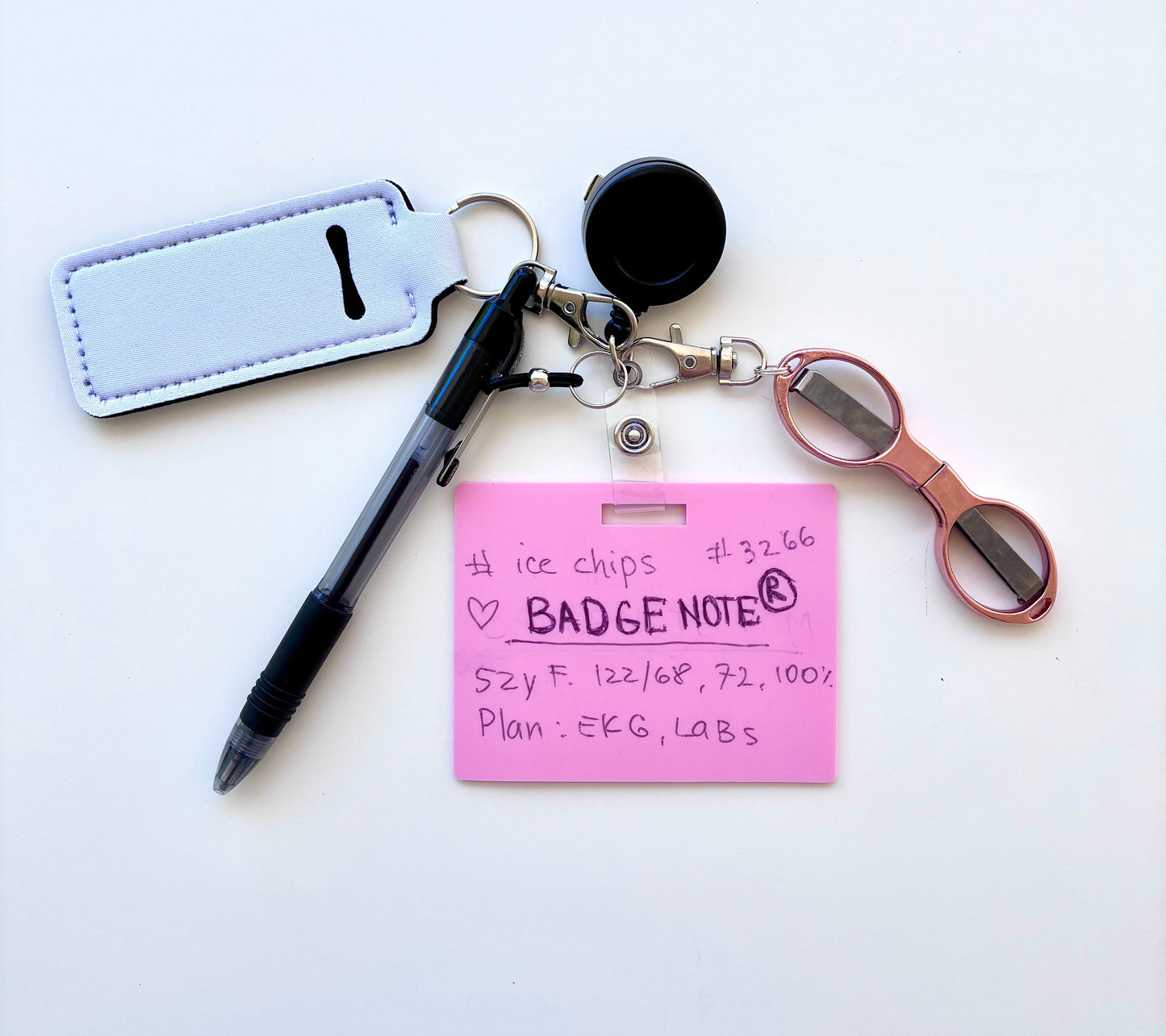Erasable, reusable badge note with mini scissors, ballpoint pen, chapstick holder all attached to badge reel. Complete set gift idea for healthcare professionals, educators, office staff and more. BADGENOTE.COM