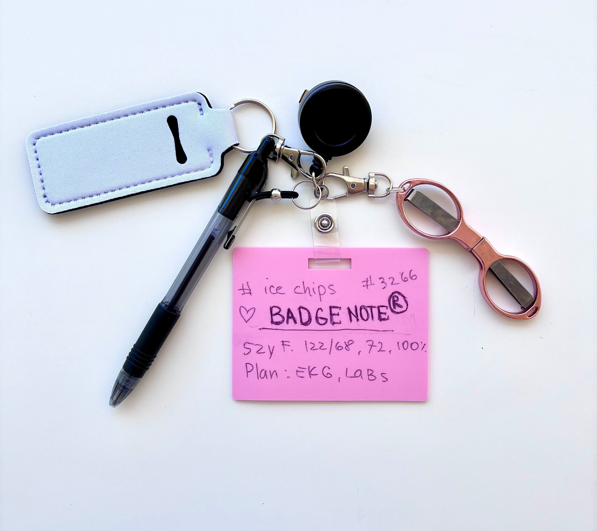 Erasable, reusable badge note with mini scissors, ballpoint pen, chapstick holder all attached to badge reel. Complete set gift idea for healthcare professionals, educators, office staff and more. BADGENOTE.COM
