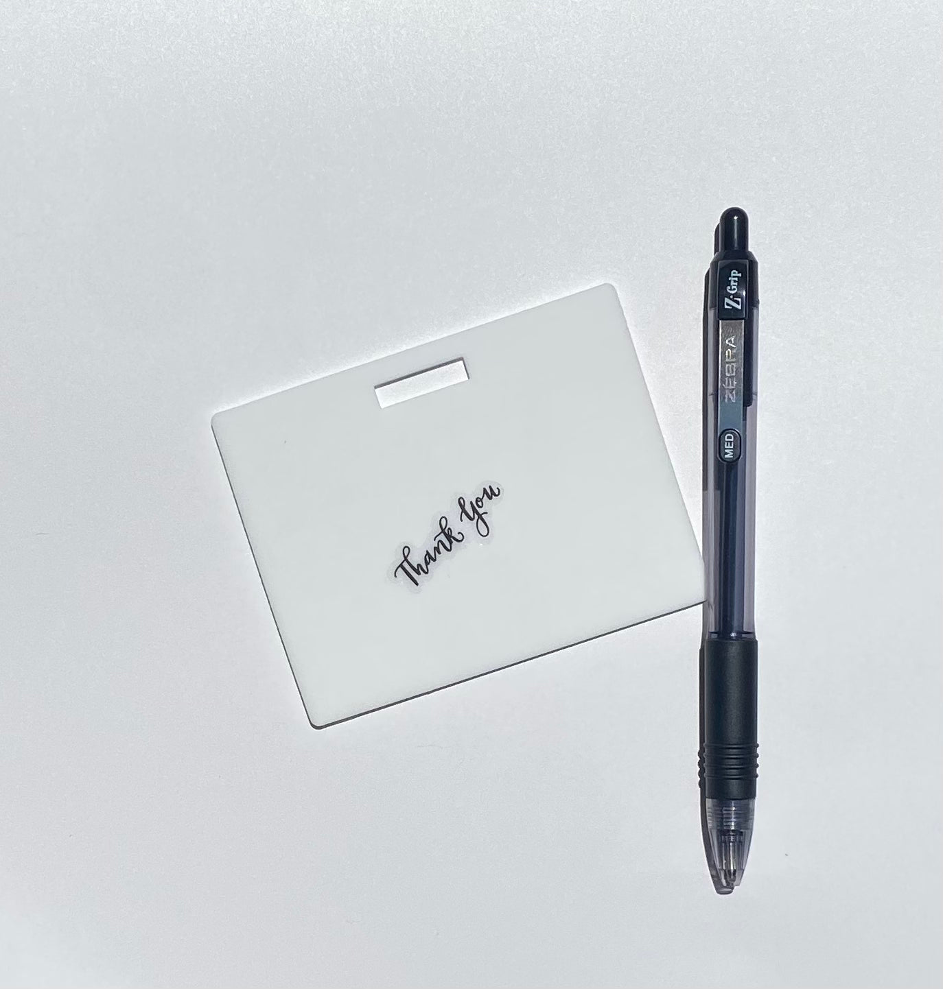 Ballpoint pen included. Horizontal erasable badge is the perfect pocket-sized accessory for healthcare professionals. Easily write on it with ballpoint pen, wipe it clean with alcohol pad, and reuse. Made of lightweight soft silicone, it's a nurse's essential for taking notes on the go. Attach it to your ID badge for convenience. ATTENTION: Gel &amp; super smooth/colored ink will smudge and may leave faint stains. www.badgenote.com