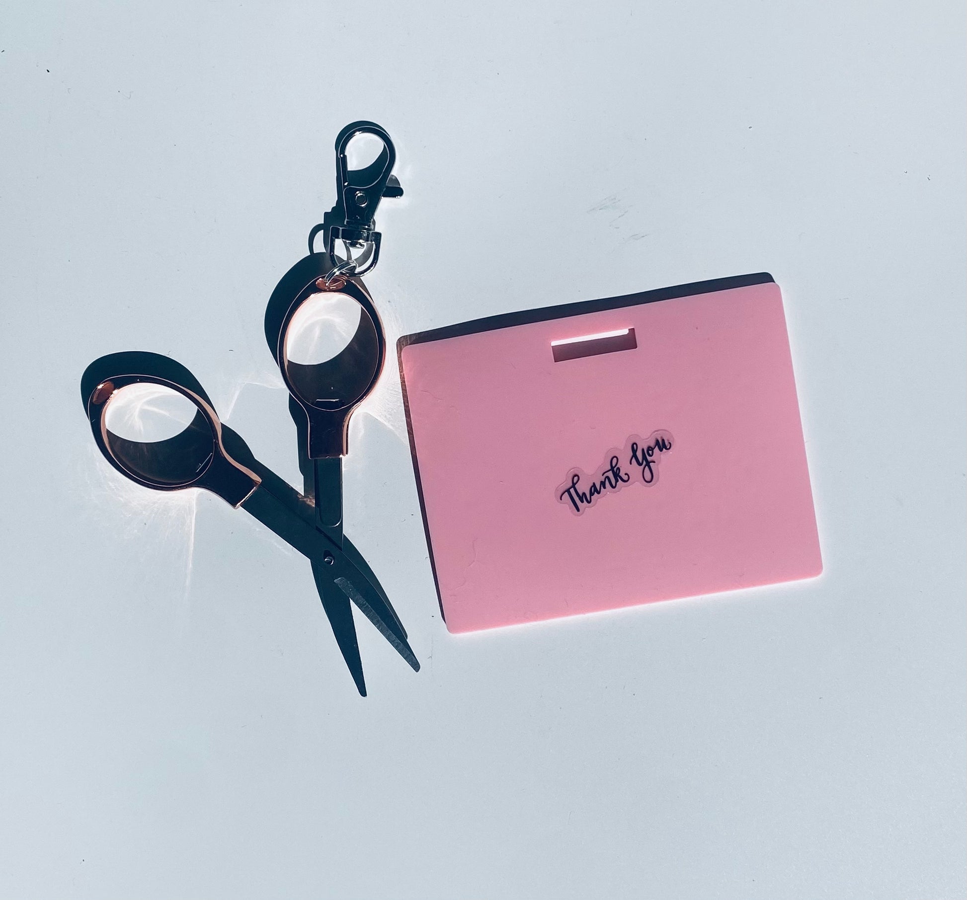 Horizontal erasable badge with mini Scissors is the perfect pocket-sized accessory for healthcare professionals. Easily write on it with ballpoint pen, wipe it clean with alcohol pad, and reuse. Made of lightweight soft silicone, it's a nurse's essential for taking notes on the go. Attach it to your ID badge for convenience. ATTENTION: Gel &amp; super smooth/colored ink will smudge and may leave faint stains. www.badgenote.com