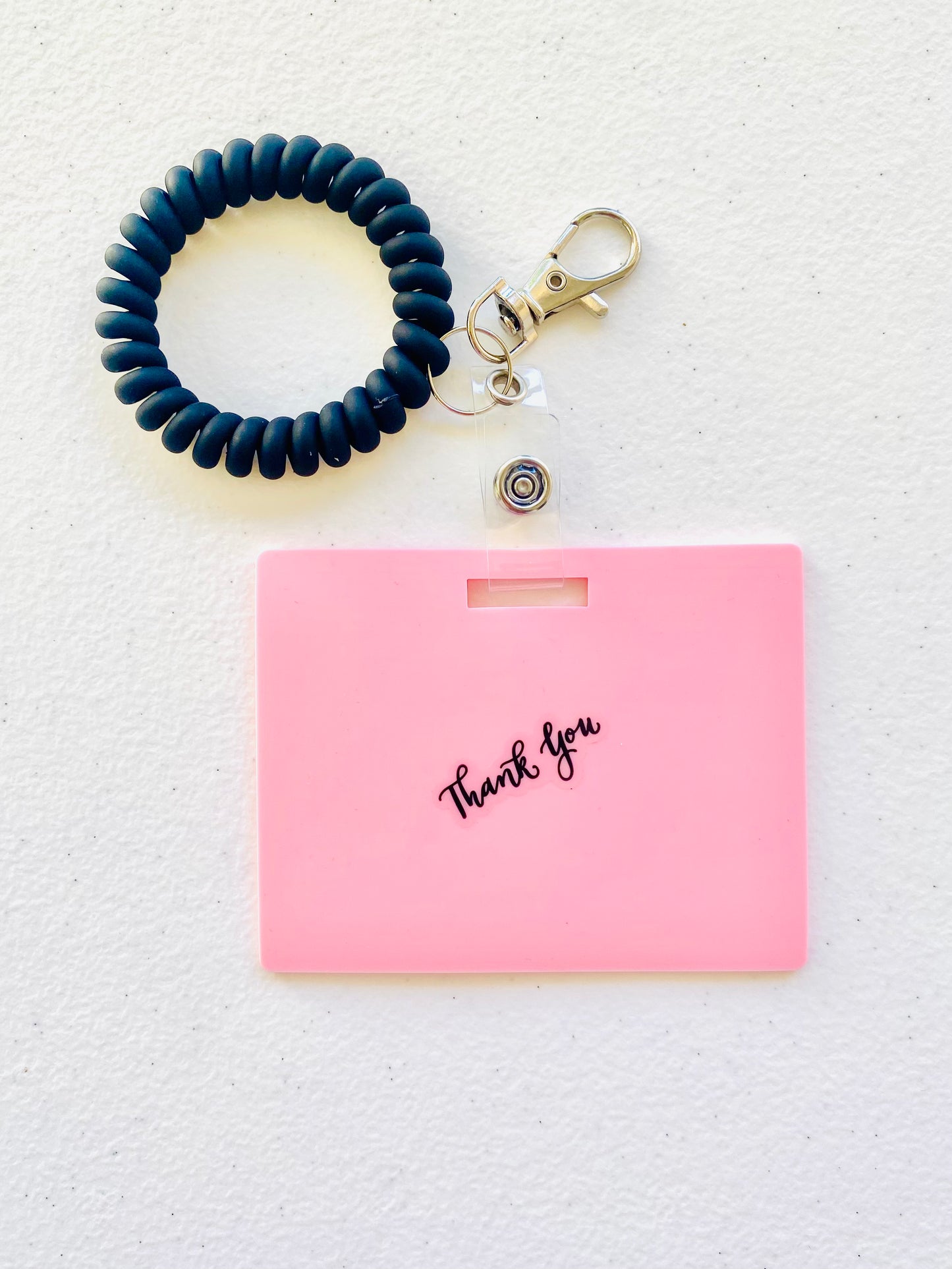Keep your shopping list handy with this horizontal reusable erasable notepad designed for keychains. Simply write using a ballpoint pen, erase with an alcohol pad, and reuse as needed. It easily clips onto your keys or purse, ensuring your list is always within reach. Please note, gel &amp; super smooth/color ballpoint inks could leave faint marks. This practical accessory offers a reliable way to stay organized on the go. www.badgenote.com