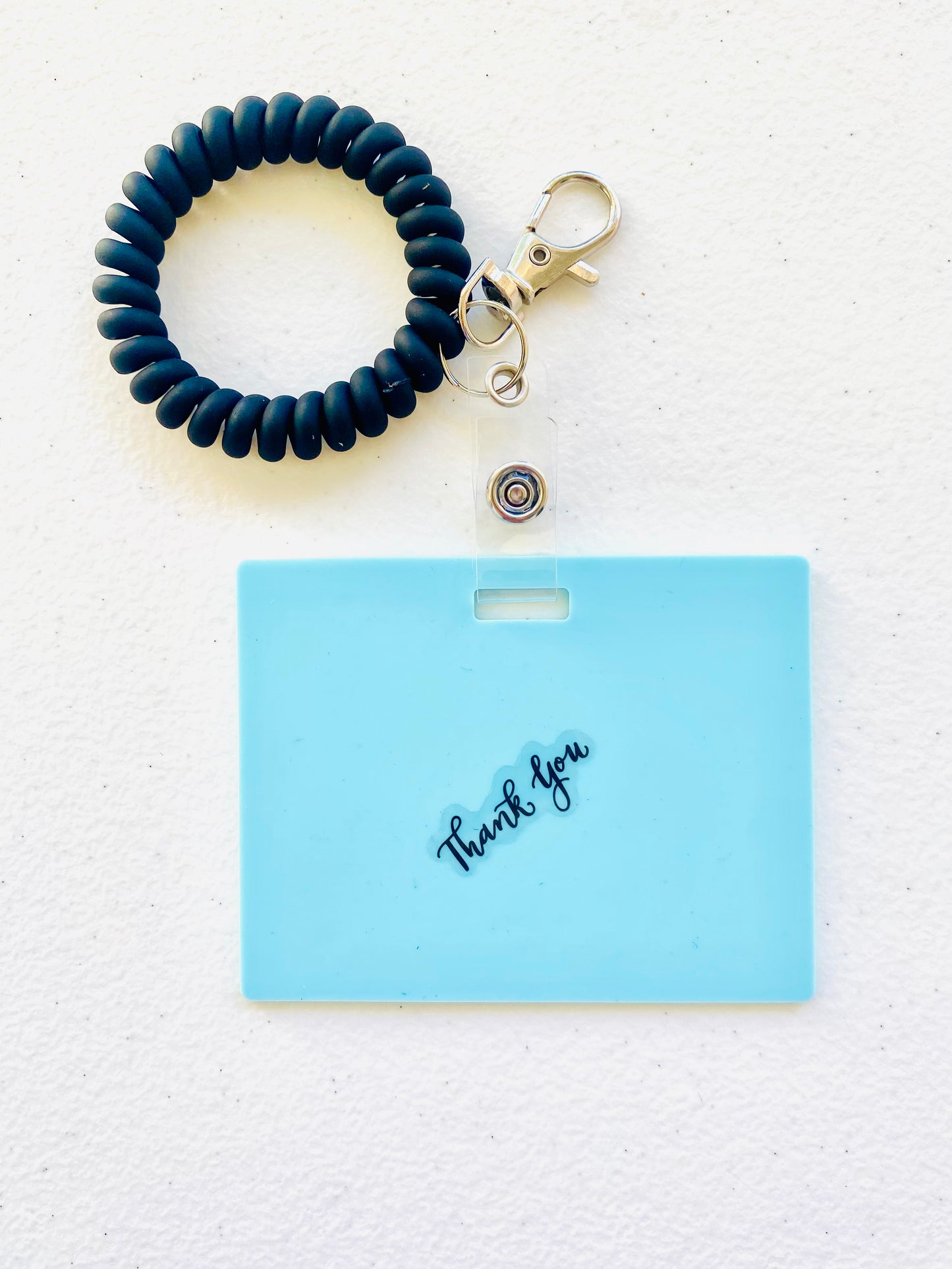Keep your shopping list handy with this horizontal reusable erasable notepad designed for keychains. Simply write using a ballpoint pen, erase with an alcohol pad, and reuse as needed. It easily clips onto your keys or purse, ensuring your list is always within reach. Please note, gel &amp; super smooth/color ballpoint inks could leave faint marks. This practical accessory offers a reliable way to stay organized on the go. www.badgenote.com
