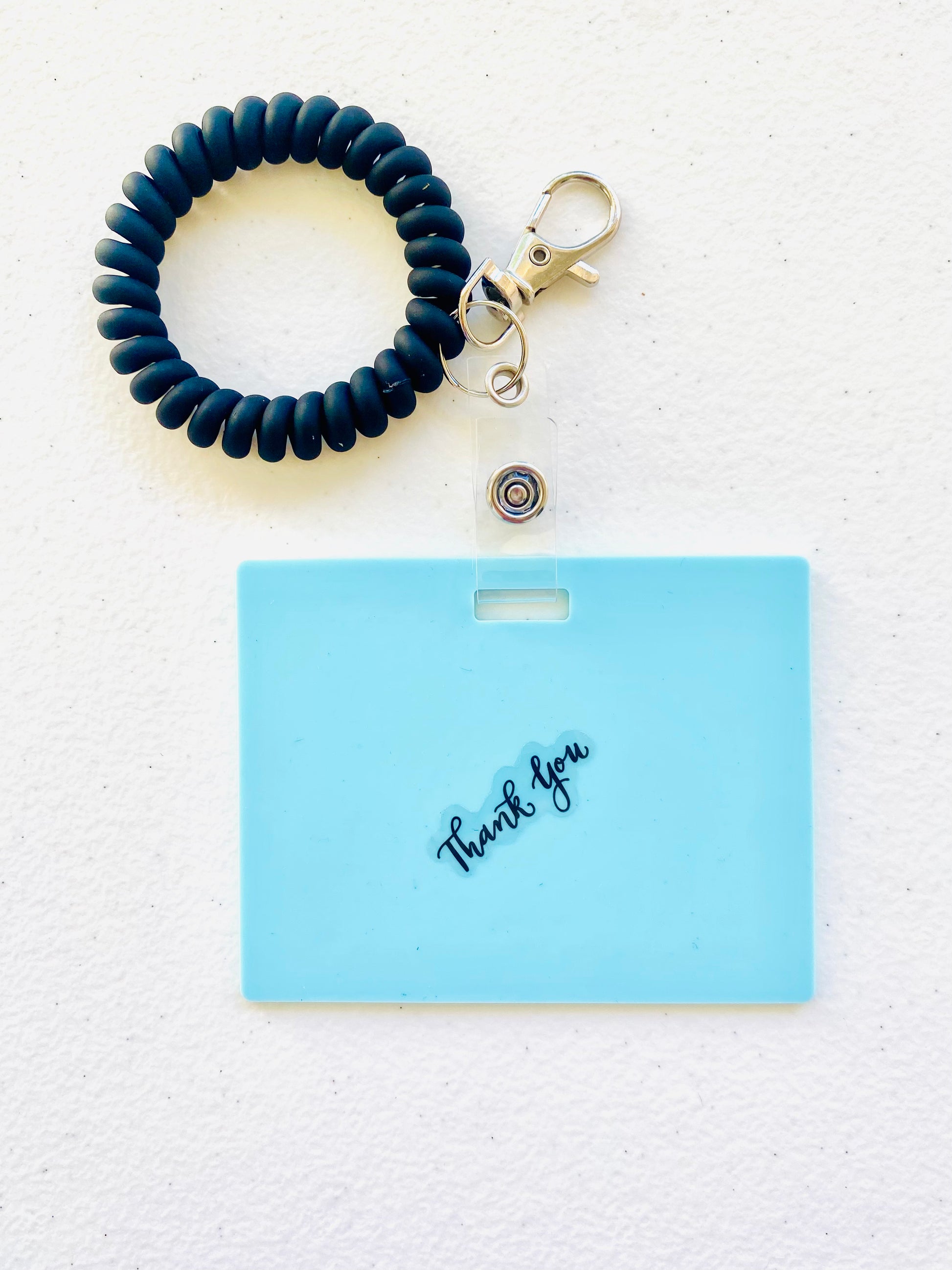 Keep your shopping list handy with this horizontal reusable erasable notepad designed for keychains. Simply write using a ballpoint pen, erase with an alcohol pad, and reuse as needed. It easily clips onto your keys or purse, ensuring your list is always within reach. Please note, gel &amp; super smooth/color ballpoint inks could leave faint marks. This practical accessory offers a reliable way to stay organized on the go. www.badgenote.com