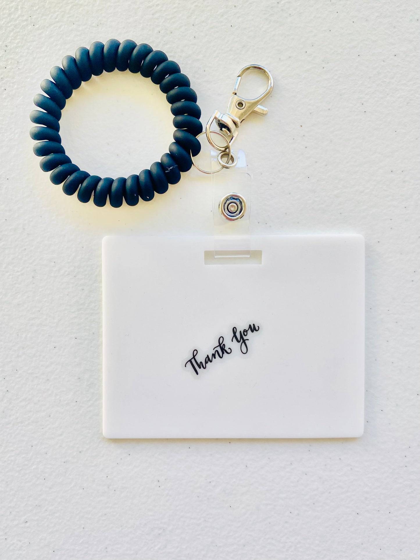Keep your shopping list handy with this horizontal reusable erasable notepad designed for keychains. Simply write using a ballpoint pen, erase with an alcohol pad, and reuse as needed. It easily clips onto your keys or purse, ensuring your list is always within reach. Please note, gel &amp; super smooth/color ballpoint inks could leave faint marks. This practical accessory offers a reliable way to stay organized on the go. www.badgenote.com