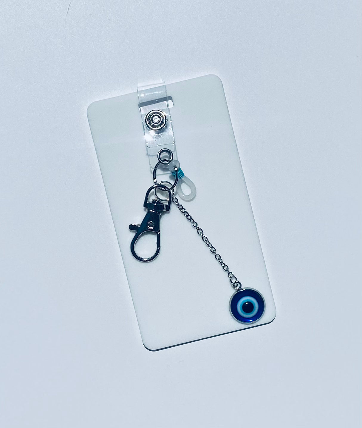 Keep your shopping list handy with this vertical reusable erasable badge note designed for keychains. Simply write using a ballpoint pen, erase with an alcohol pad, and reuse as needed. It easily clips onto your keys or purse, ensuring your list is always within reach. Please note, gel &amp; super smooth/color ballpoint inks could leave faint marks. This practical accessory offers a reliable way to stay organized on the go.