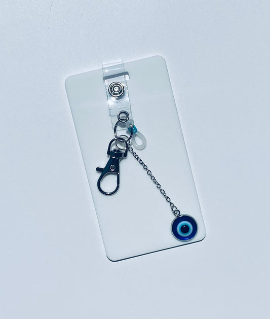 Keep your shopping list handy with this vertical reusable erasable badge note designed for keychains. Simply write using a ballpoint pen, erase with an alcohol pad, and reuse as needed. It easily clips onto your keys or purse, ensuring your list is always within reach. Please note, gel &amp; super smooth/color ballpoint inks could leave faint marks. This practical accessory offers a reliable way to stay organized on the go.