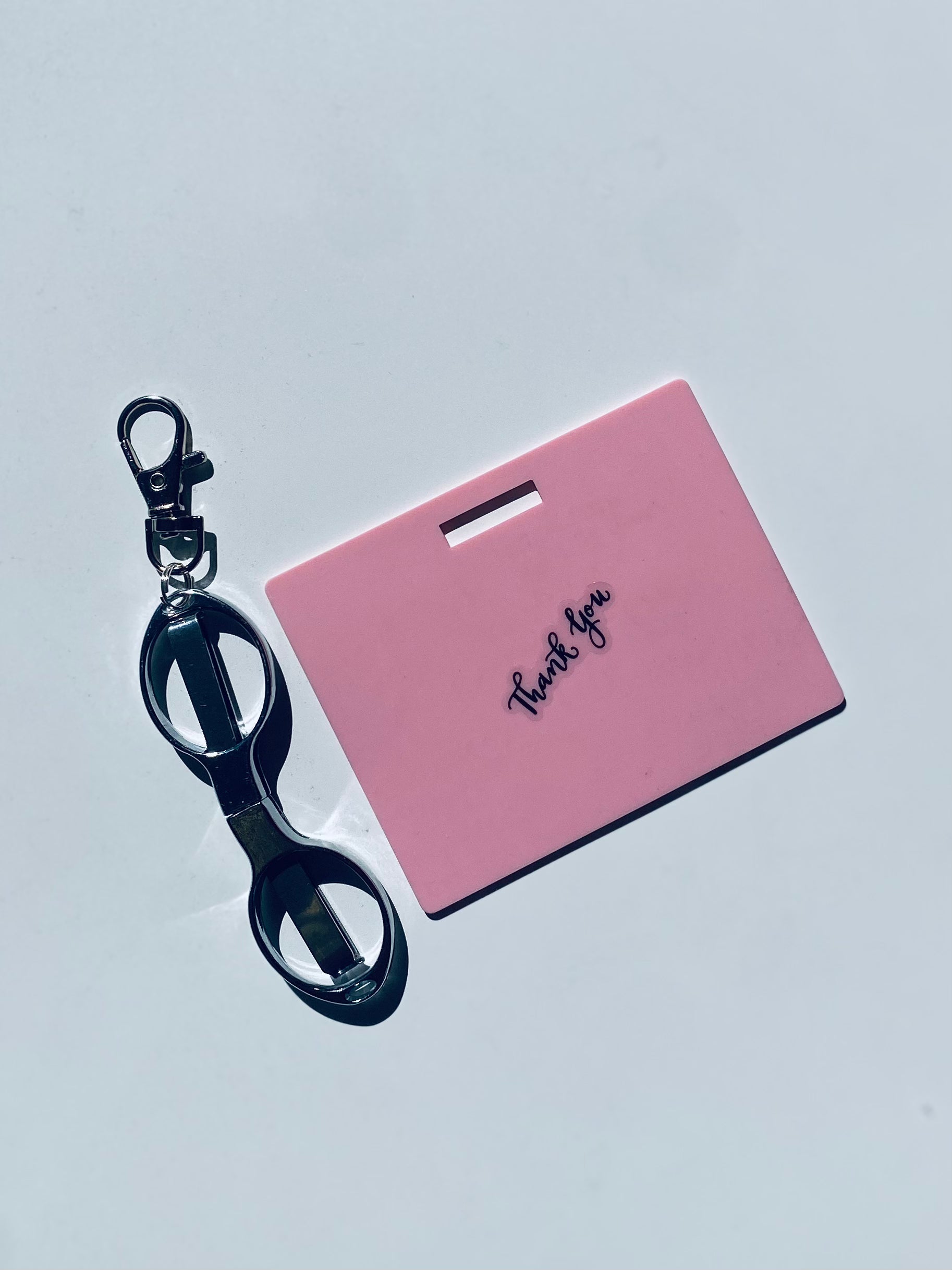 Horizontal erasable badge with mini Scissors is the perfect pocket-sized accessory for healthcare professionals. Easily write on it with ballpoint pen, wipe it clean with alcohol pad, and reuse. Made of lightweight soft silicone, it's a nurse's essential for taking notes on the go. Attach it to your ID badge for convenience. ATTENTION: Gel &amp; super smooth/colored ink will smudge and may leave faint stains. www.badgenote.com