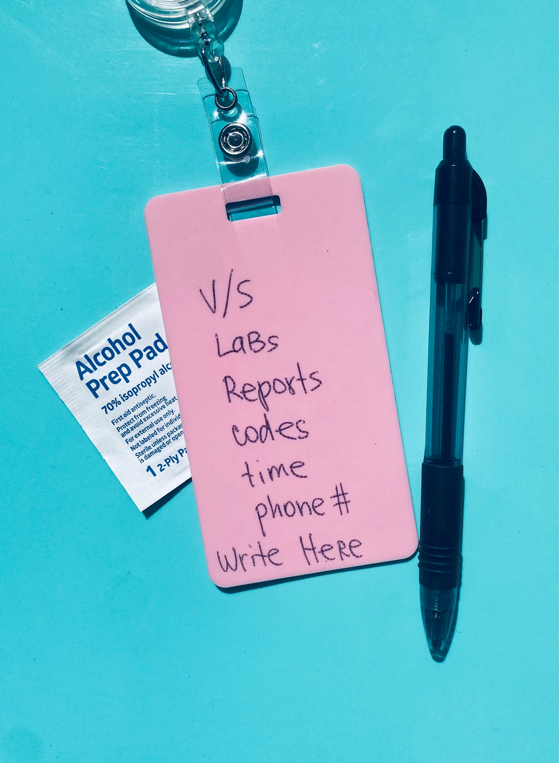 Pink vertical erasable badge is the perfect pocket-sized accessory for healthcare professionals. Easily write on it with ballpoint pen, wipe it clean with alcohol pad, and reuse. Made of lightweight soft silicone, it's a nurse's essential for taking notes on the go. Attach it to your ID badge for convenience. ATTENTION: Gel ink will smear and will not get completely clean if left on for few hours. www.badgenote.com 