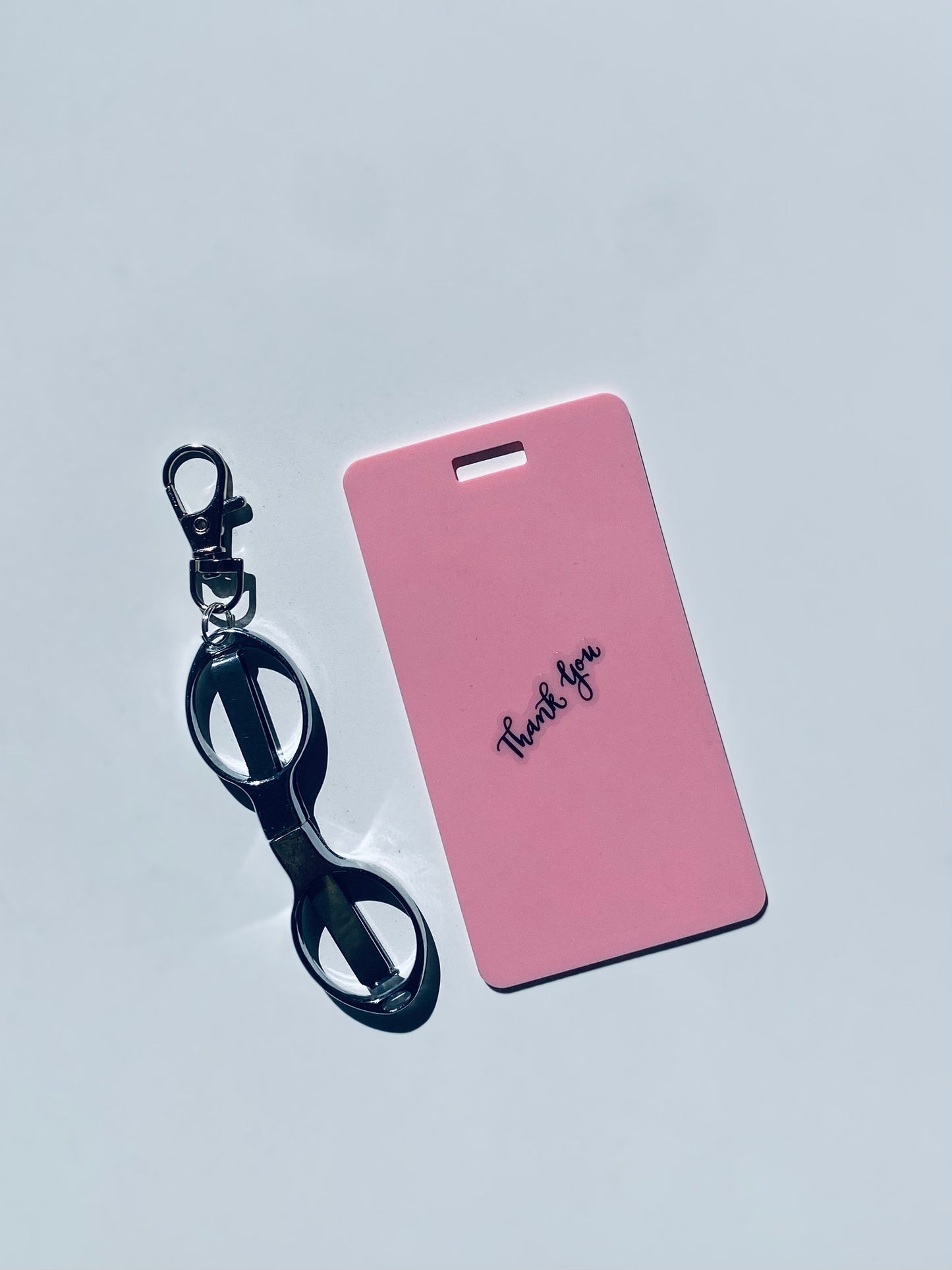 Vertical erasable badge with mini Scissors is the perfect pocket-sized accessory for healthcare professionals. Easily write on it with ballpoint pen, wipe it clean with alcohol pad, and reuse. Made of lightweight soft silicone, it's a nurse's essential for taking notes on the go. Attach it to your ID badge for convenience. ATTENTION: Gel &amp; super smooth/colored ink will smudge and may leave faint stains.