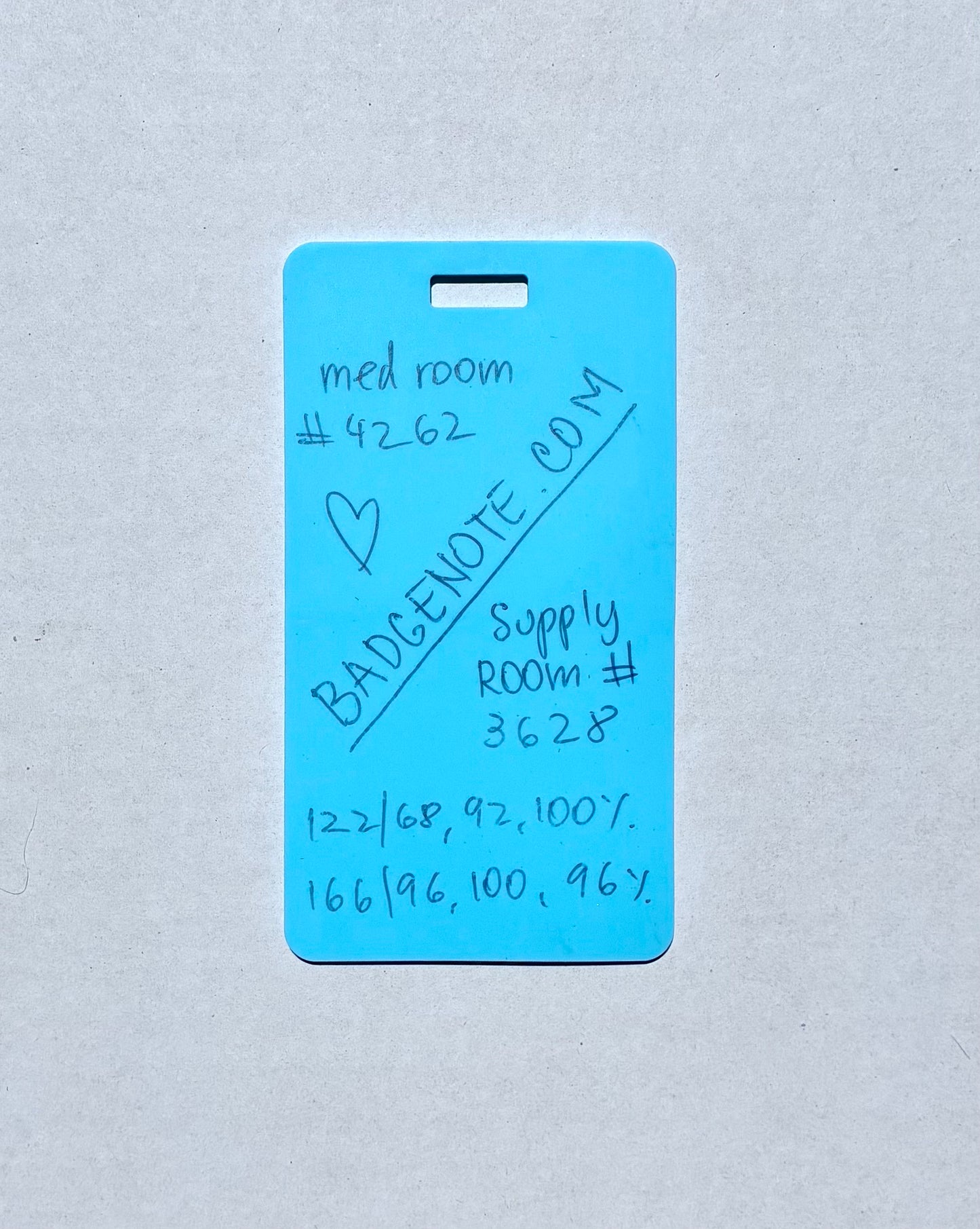 BADGENOTE.COM Vertical erasable badge is the perfect pocket-sized accessory for healthcare professionals. Easily write on it with ballpoint pen, wipe it clean with alcohol pad, and reuse. Made of lightweight soft silicone, it's a nurse's essential for taking notes on the go. Attach it to your ID badge for convenience. ATTENTION: Gel &amp; super smooth/colored ink will smudge and may leave faint stains.